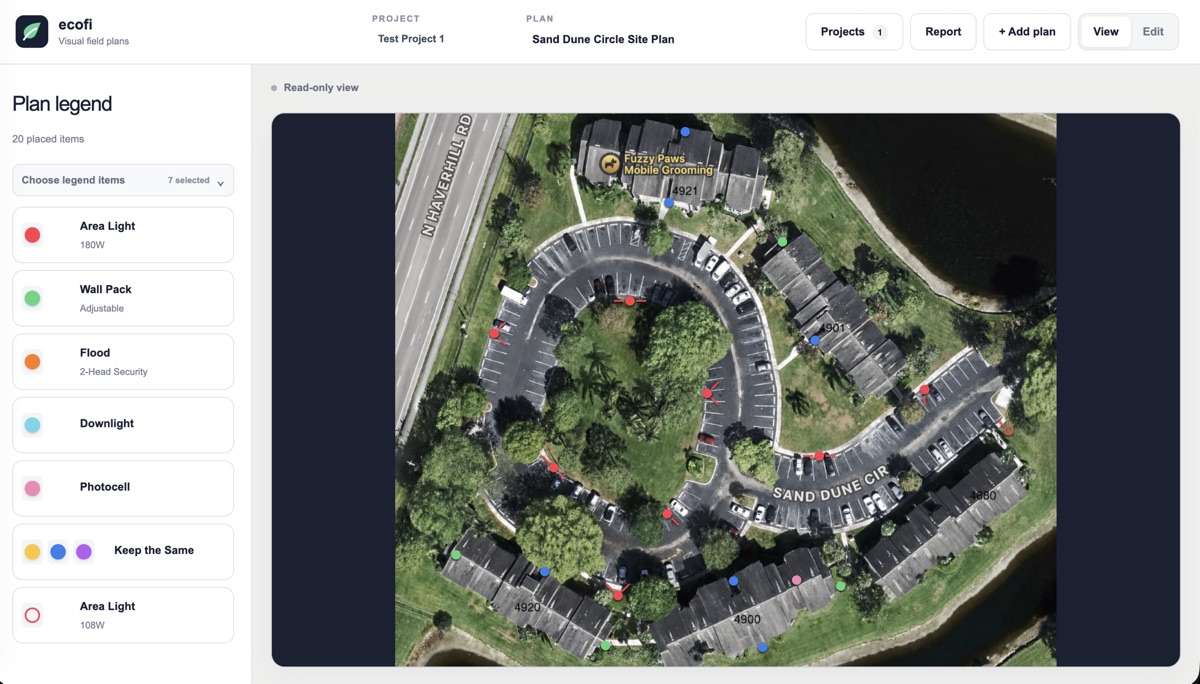 Ecofi lighting plan with a configurable legend and directional fixture markers placed over an aerial image